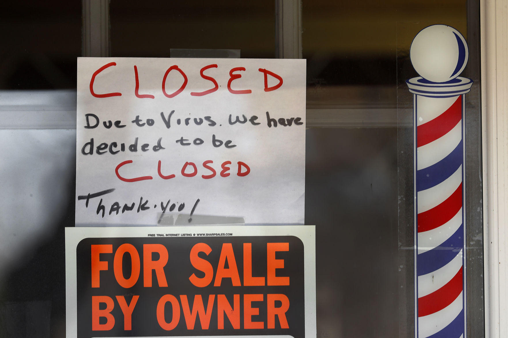 APTOPIX Virus Outbreak Michigan Economy